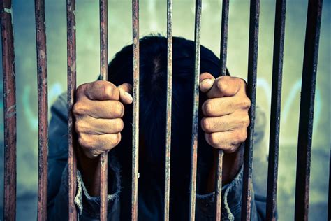 Putting in jail .